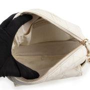 Vintage Chanel bag in white beige crafted in leather with gold metallic chain