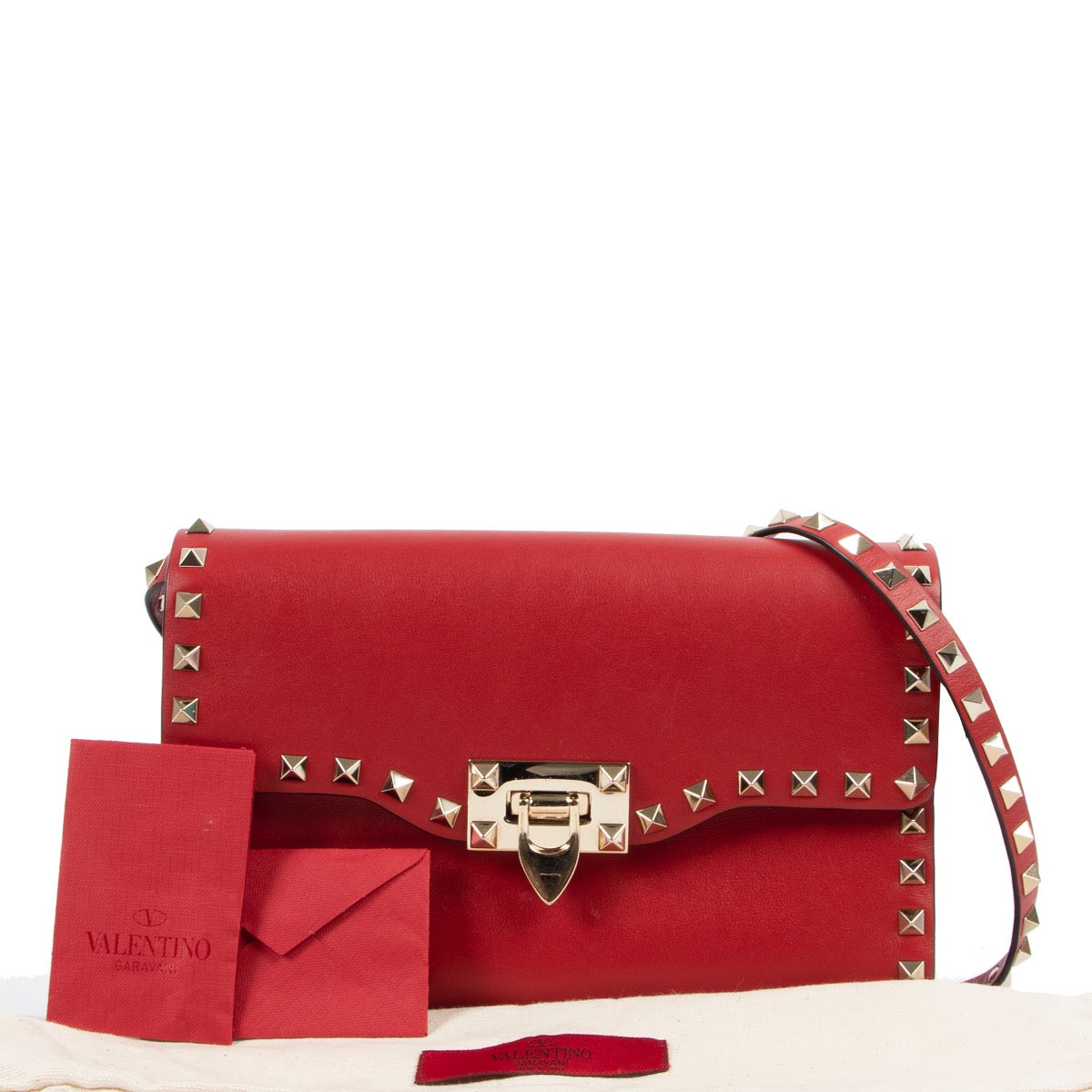 Shop safe online at Labellov in Antwerp this 100% authentic second hand Valentino Garavani Red Leather Rockstud Crossbody
