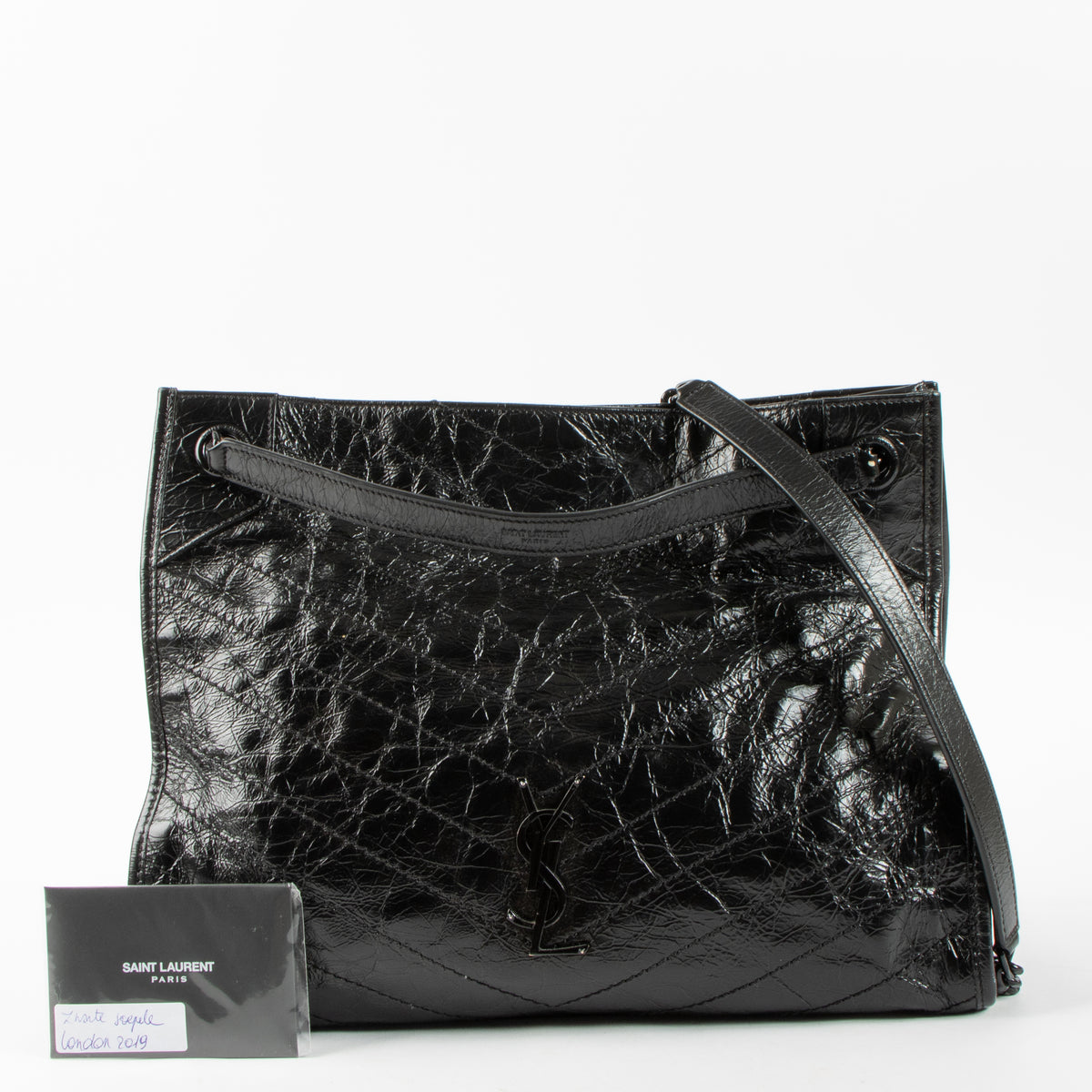 Shop this authentic luxury Saint Laurent All Black Vintage Calfksin Niki Small Shopping Bag Pre-Loved on Labellov.com
