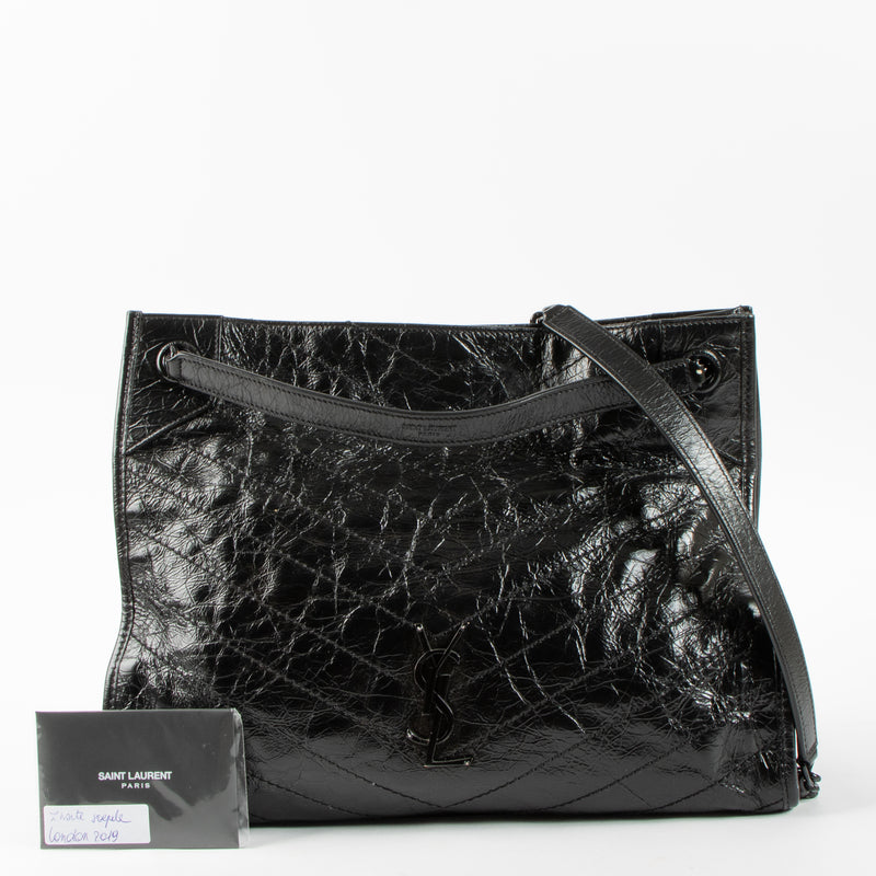 Shop this authentic luxury Saint Laurent All Black Vintage Calfksin Niki Small Shopping Bag Pre-Loved on Labellov.com