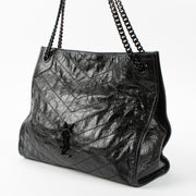 Shop this authentic luxury Saint Laurent All Black Vintage Calfksin Niki Small Shopping Bag Pre-Loved on Labellov.com