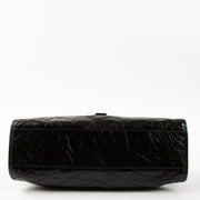 Shop this authentic luxury Saint Laurent All Black Vintage Calfksin Niki Small Shopping Bag Pre-Loved on Labellov.com