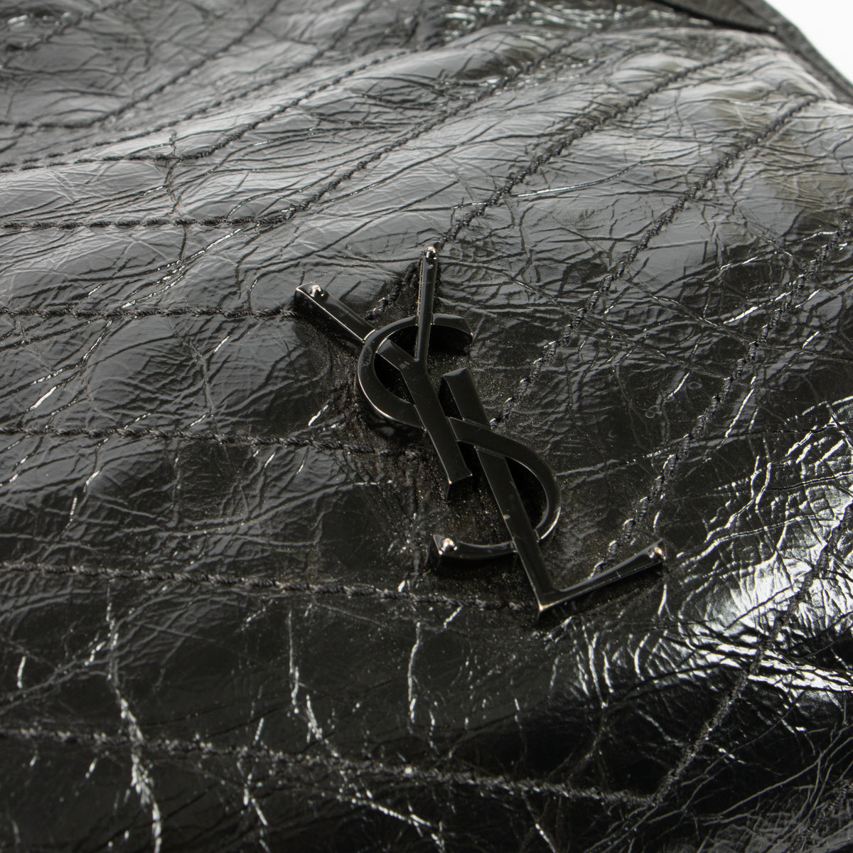 Shop this authentic luxury Saint Laurent All Black Vintage Calfksin Niki Small Shopping Bag Pre-Loved on Labellov.com