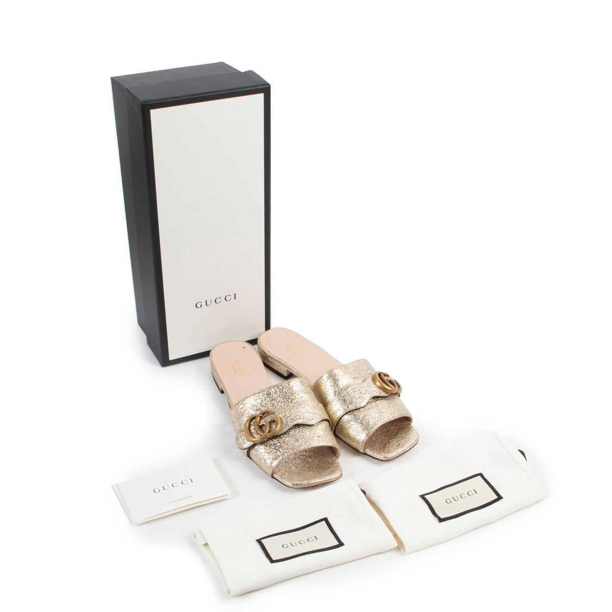 Gucci GG Gold Slippers - Size 38 at Labellov online or in store in good quality and with small sign of use.