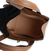 Shop safe online at Labellov in Antwerp this 100% authentic second hand Delvaux Cognac Simplissime PM Top Handle