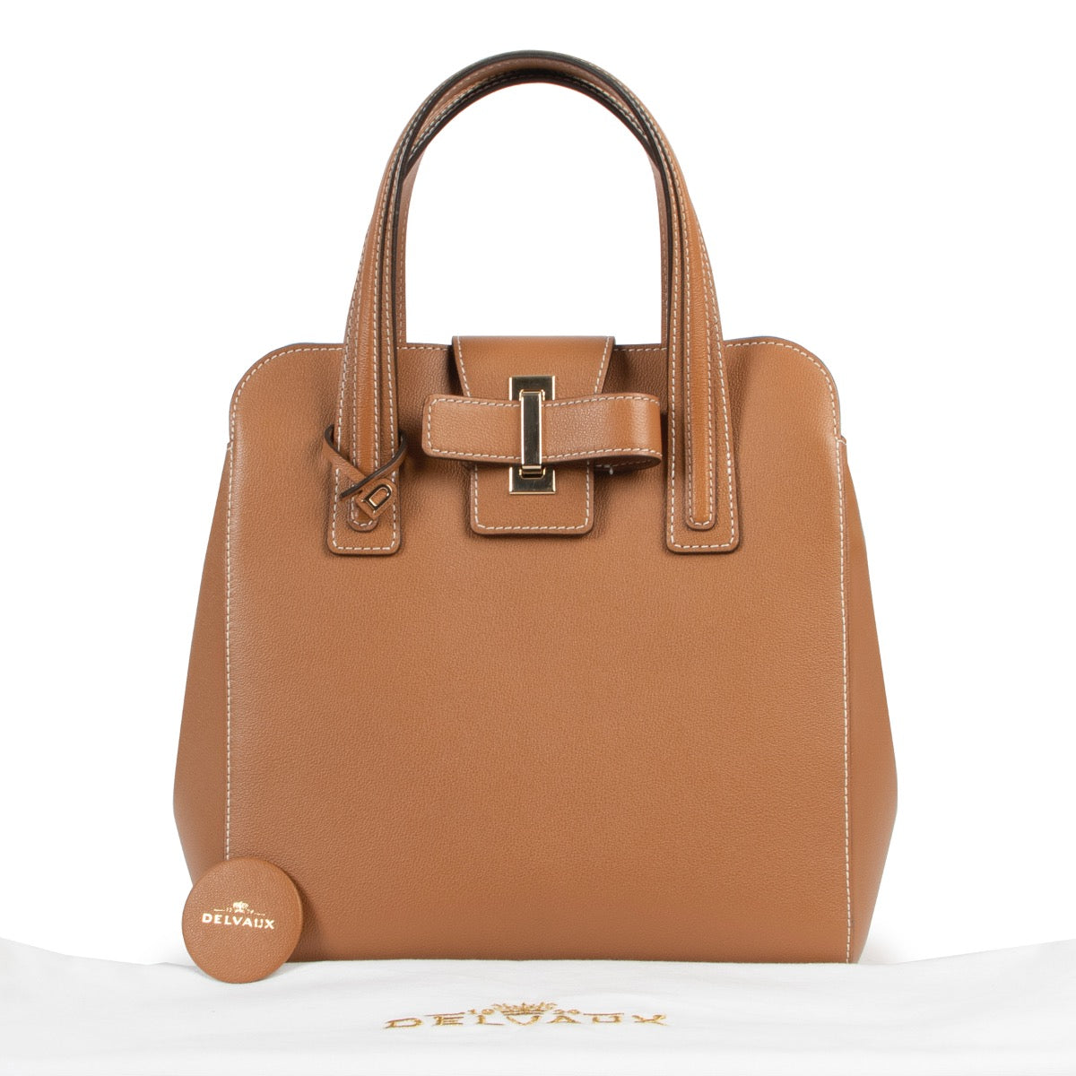 Shop safe online at Labellov in Antwerp this 100% authentic second hand Delvaux Cognac Simplissime PM Top Handle