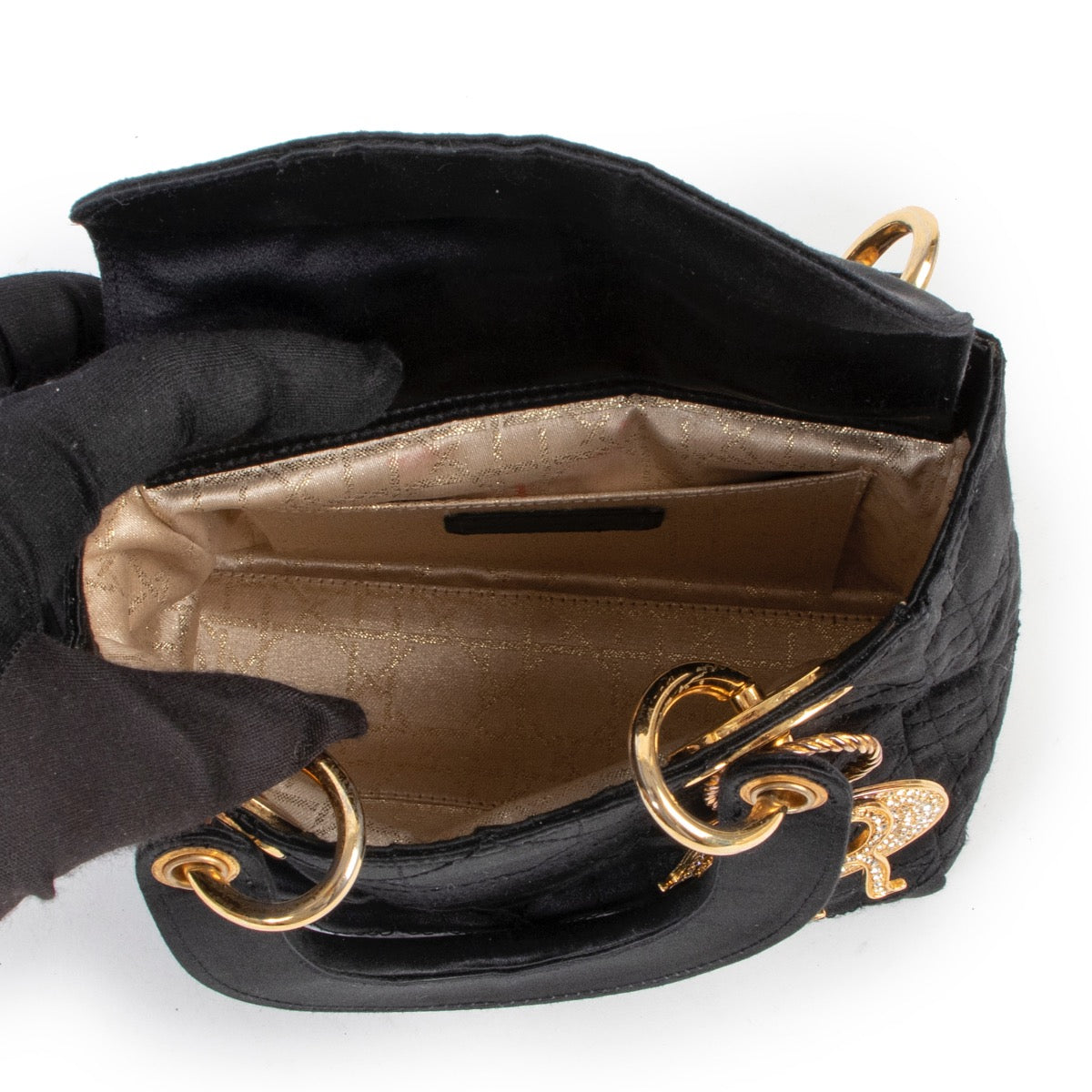 Shop safe online at Labellov in Antwerp this 100% authentic second hand Christian Dior Black Satin Mini Lady Dior in very good condition.