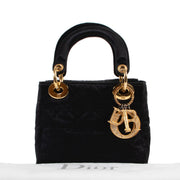 Shop safe online at Labellov in Antwerp this 100% authentic second hand Christian Dior Black Satin Mini Lady Dior in very good condition.