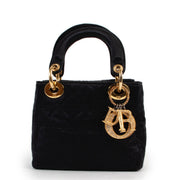 Shop safe online at Labellov in Antwerp this 100% authentic second hand Christian Dior Black Satin Mini Lady Dior in very good condition.