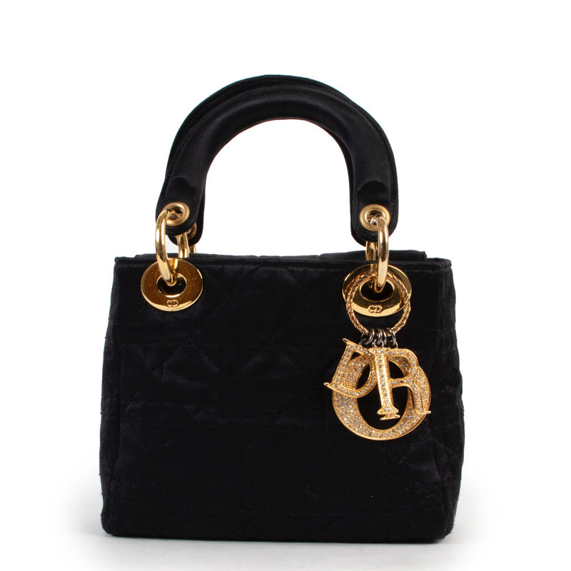 Shop safe online at Labellov in Antwerp this 100% authentic second hand Christian Dior Black Satin Mini Lady Dior in very good condition.