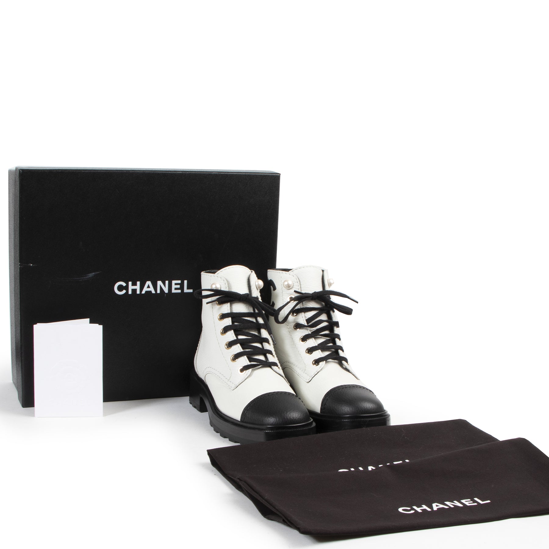 100% authentic Chanel Black and White Combat Boots