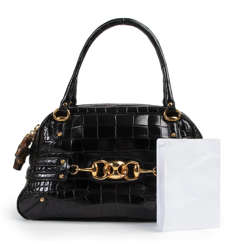 Bent u op zoek naar een authentieke designer Gucci Black Croco Wave Boston Bag