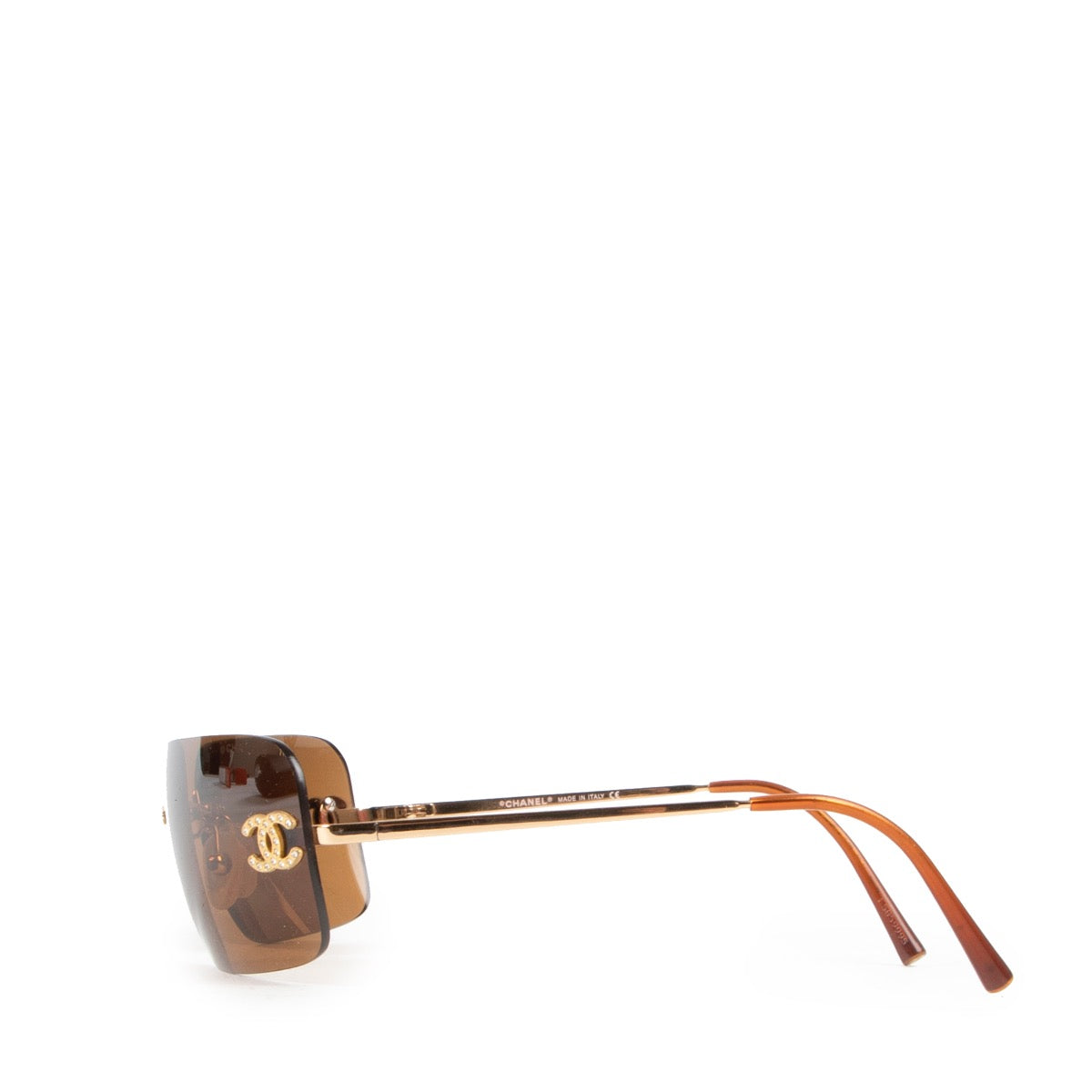 Achetez en ligne en toute sécurité les authentiques lunettes Chanel Brown Rimless.
