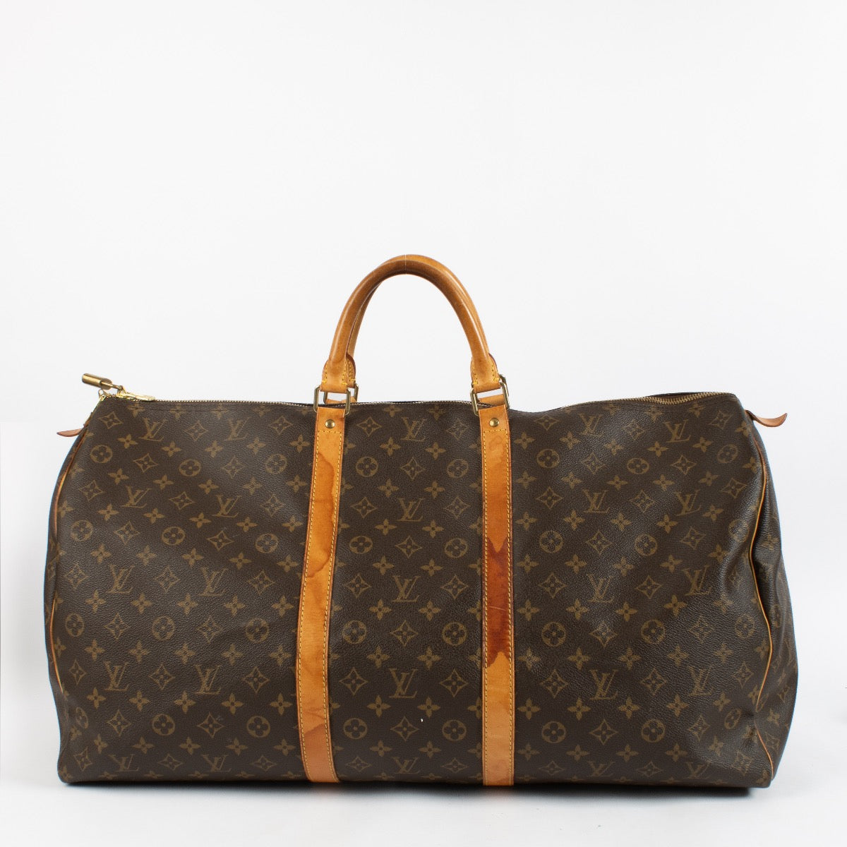 Shop safe online at Labellov in Antwerp, Brussels and Knokke this 100% authentic second hand Louis Vuitton Monogram Canvas Keepall 60