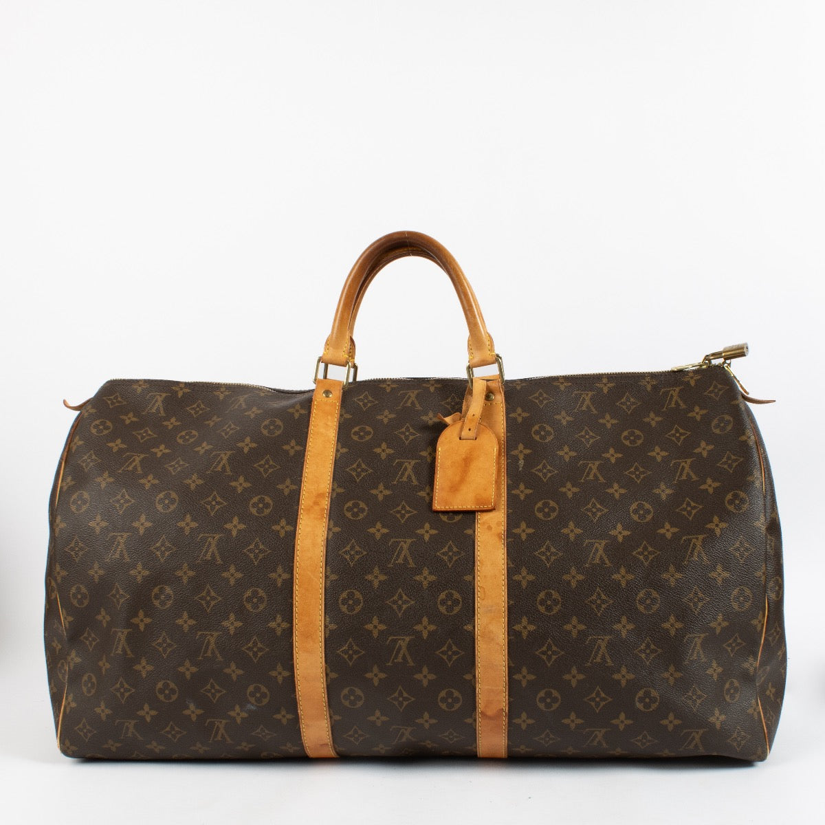 Shop safe online at Labellov in Antwerp, Brussels and Knokke this 100% authentic second hand Louis Vuitton Monogram Canvas Keepall 60