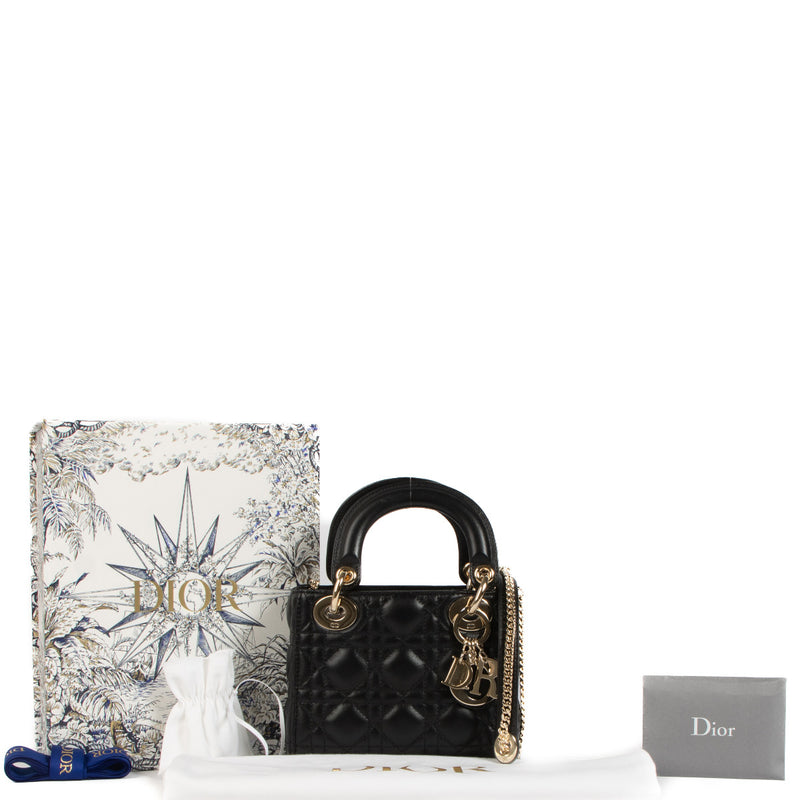 Christian Dior Black Cannage Mini Lady Dior Bag for the best price at labellov secondhand luxury in Antwerp. We buy and sell your preloved and brand new designer bags for the best price.