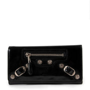 Balenciaga Black Patent Leather City Wallet for the best price available online at Labellov secondhand luxury in Antwerp. Buy and sell your preloved and new designer bags and accessories for the best price.