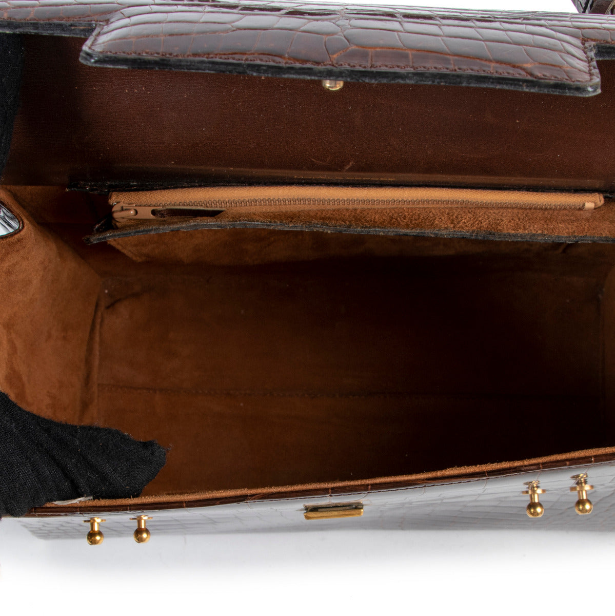 Delvaux Tempete Croco Brown GHW for the best price at Labellov for sale online at Labellov secondhand luxury in Antwerp Belgium. We buy and sell your authentic designer bags. Vintage tempete.