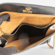 Shop the 100% authentic Delvaux Vintage Black Patent Leather Chain Bag second hand on Labellov.com!