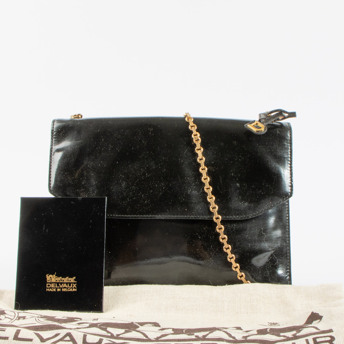 Shop the 100% authentic Delvaux Vintage Black Patent Leather Chain Bag second hand on Labellov.com!