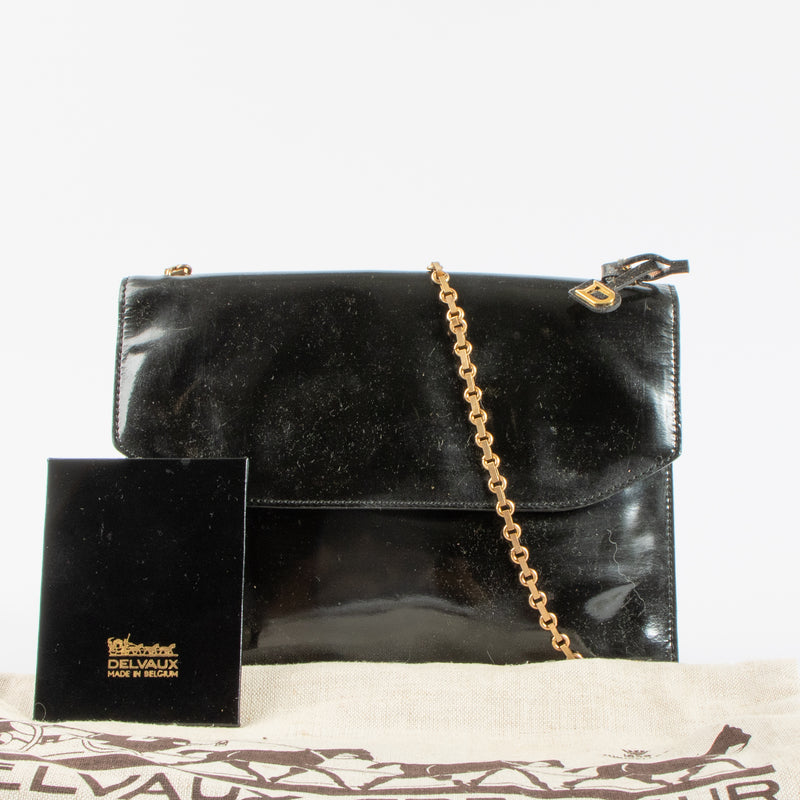 Shop the 100% authentic Delvaux Vintage Black Patent Leather Chain Bag second hand on Labellov.com!
