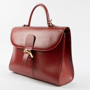 Shop the 100% authentic Delvaux Rosso Jumping Amethyste Briefcase second hand on Labellov.com!