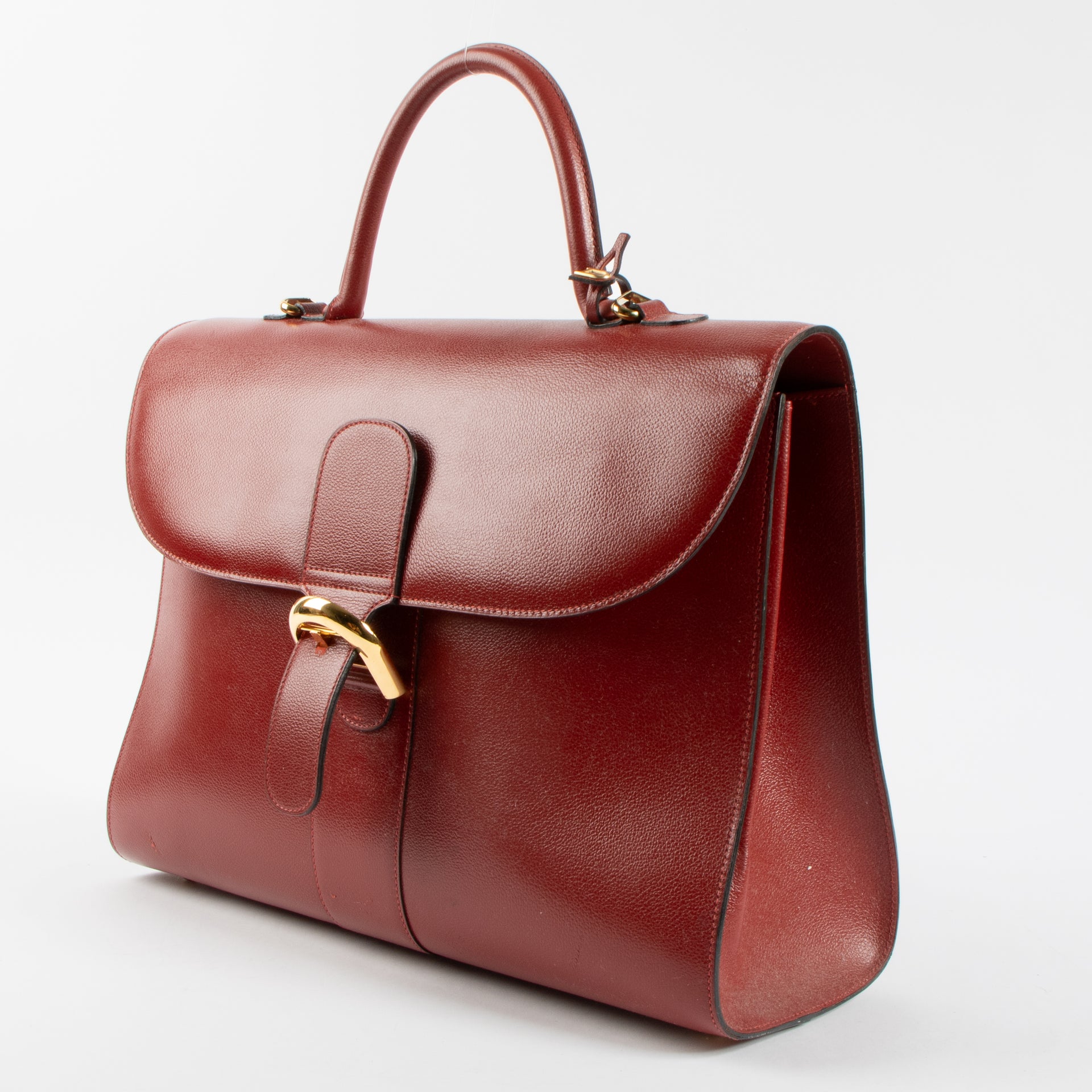 Shop the 100% authentic Delvaux Rosso Jumping Amethyste Briefcase second hand on Labellov.com!