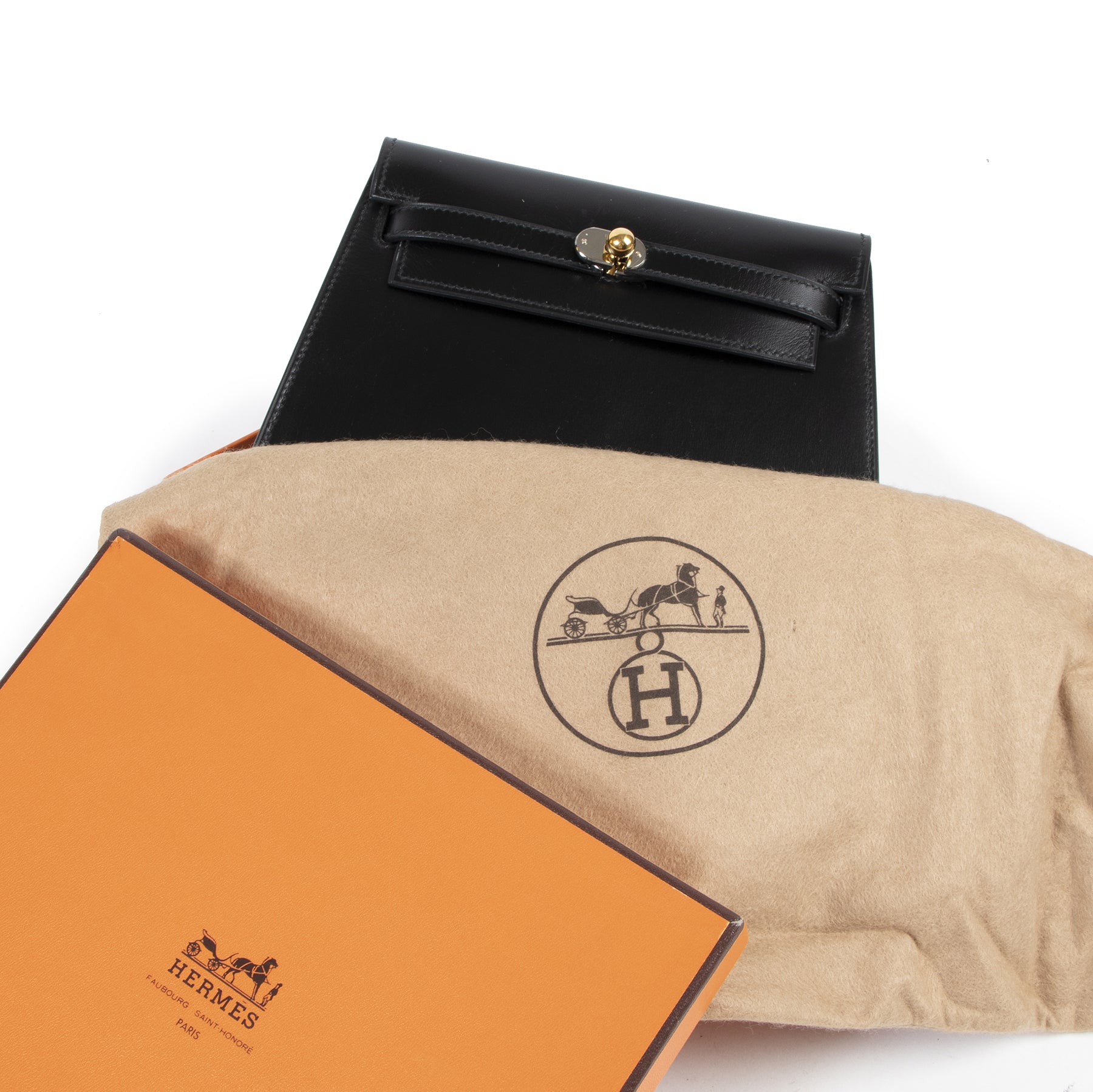 Buy an authentic second hand Hermès Black Box Calf Vintage Kelly Clutch at Labellov