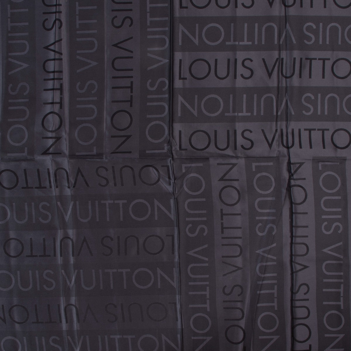 Shop authentic second hand Louis Vuitton Black Lettering Silk Twill Scarf at Labellov