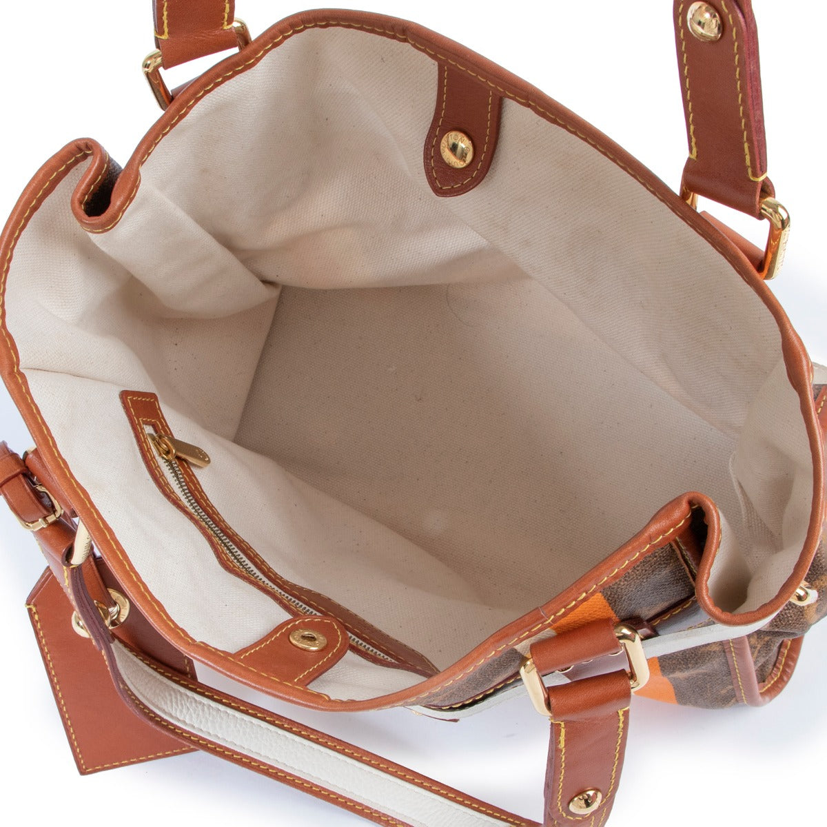 Shop safe online at Labellov in Antwerp this 100% authentic second hand Louis Vuitton Limited Edition Monogram Tisse Rayures PM Bag