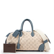 Shop authentic second hand Louis Vuitton Spring/Summer 2012 Blue Monogram Denim Speedy Round Squat MM Bag at Labellov