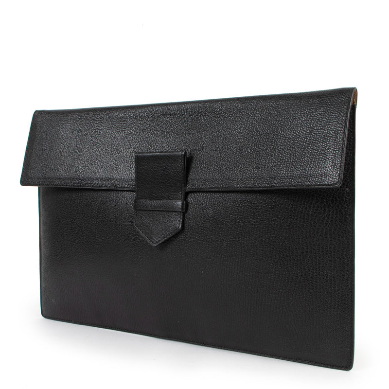 Buy an authentic second hand Delvaux Black Leather Clutch at Labellov