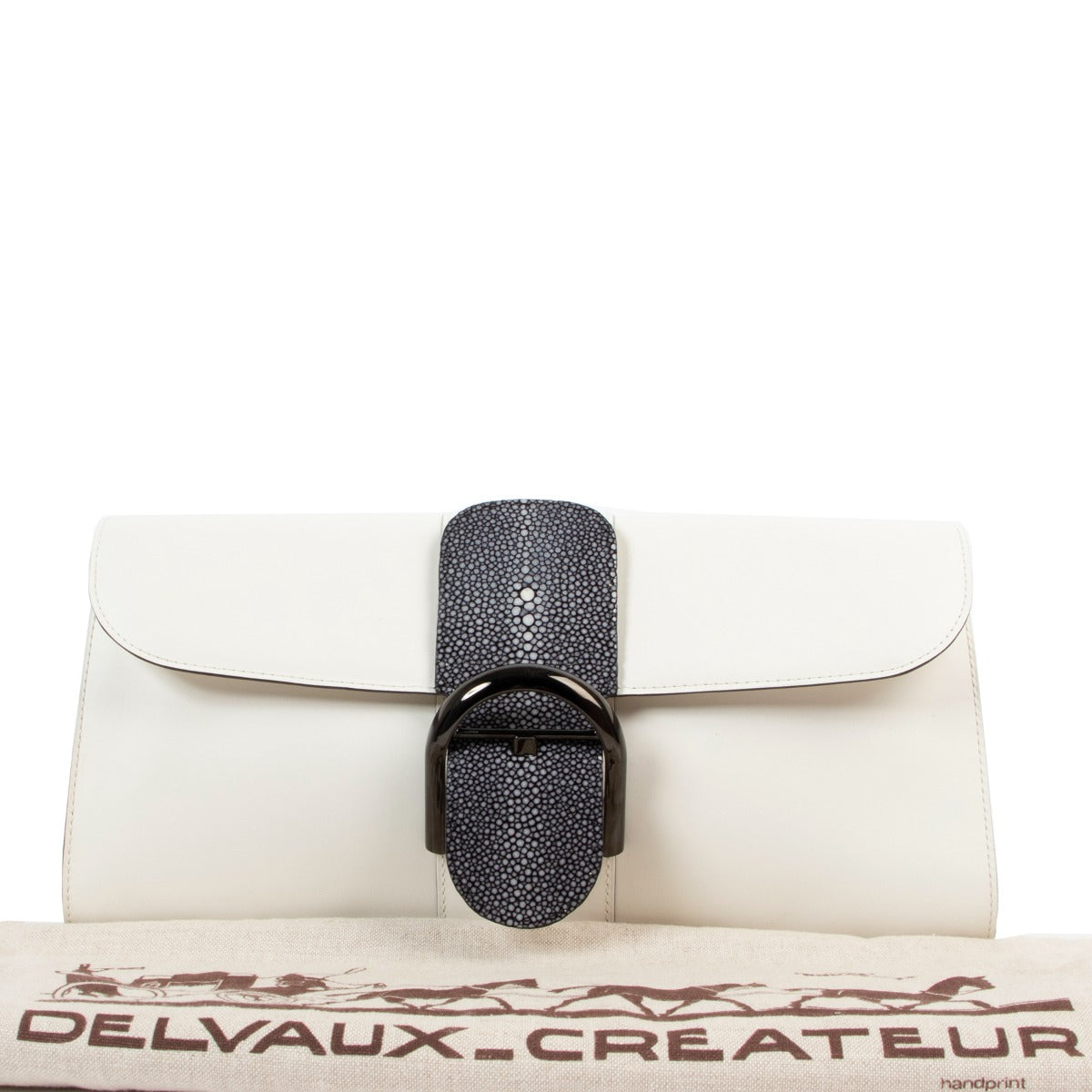 Buy second hand luxury designer vintage Delvaux White Brillant Shagreen Pochette Clutch at Labellov.
