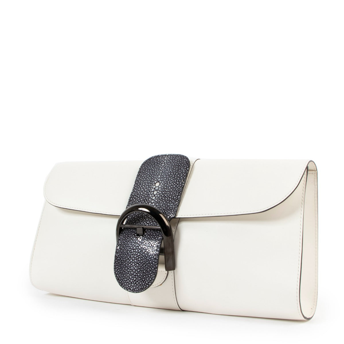 Buy second hand luxury designer vintage Delvaux White Brillant Shagreen Pochette Clutch at Labellov.