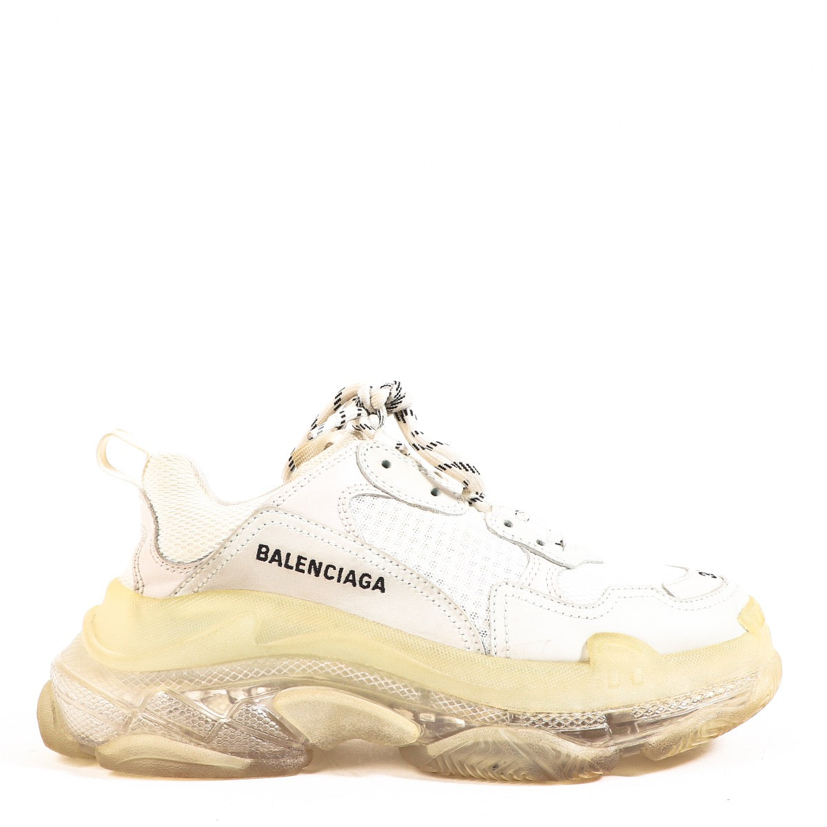 Buy an authentic Balenciaga Triple S Clear Sole Sneakers - Size 38 in good condition at Labellov in Antwerp.
