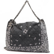 Buy an authentic Chanel Grey Bandana Canvas Shoulder Bag in very good condition at Labellov in Antwerp.