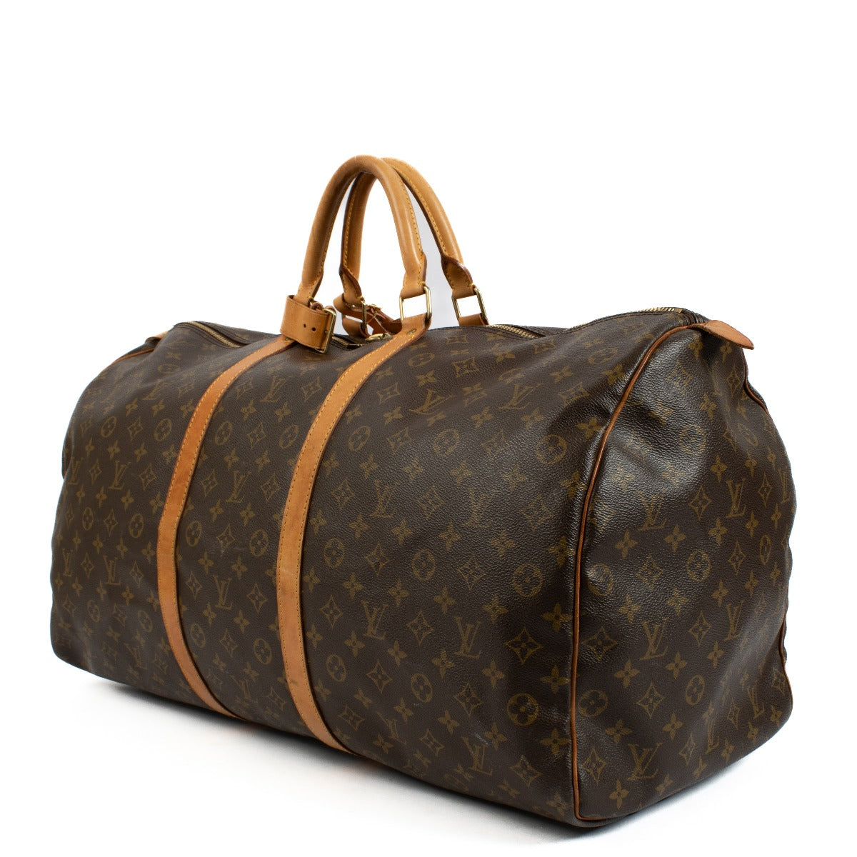 Travel in style with the Louis Vuitton Monogram Keepall 60 Travel Bag. Crafted from iconic Monogram canvas, this spacious, luxurious bag offers comfort, versatility, and timeless elegance for your journeys. Shop now on Labellov.com.