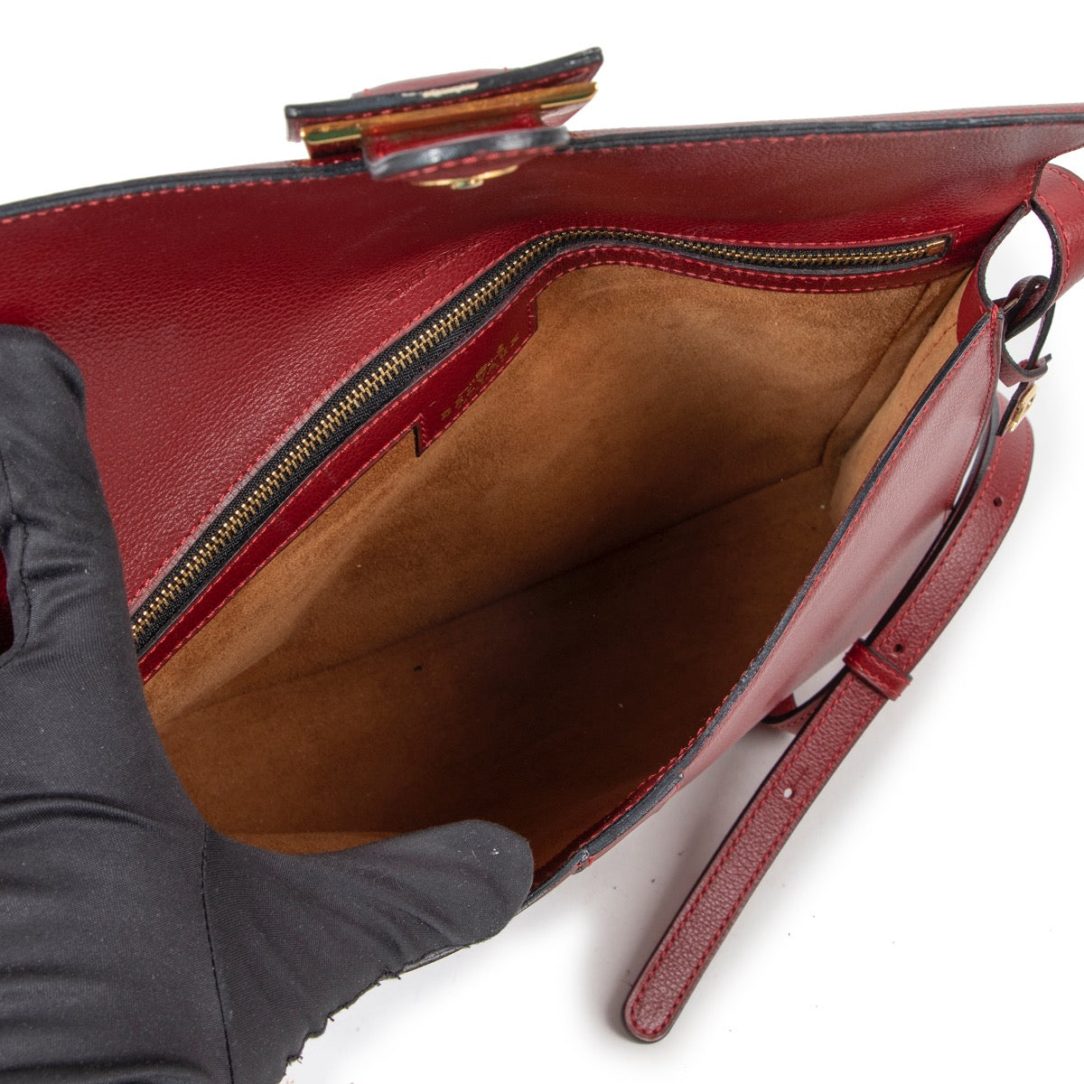 Shop safe online at Labellov in Antwerp this 100% authentic second hand Delvaux Rosso Jumping Nouveau Leather Promesse Crossbody Bag
