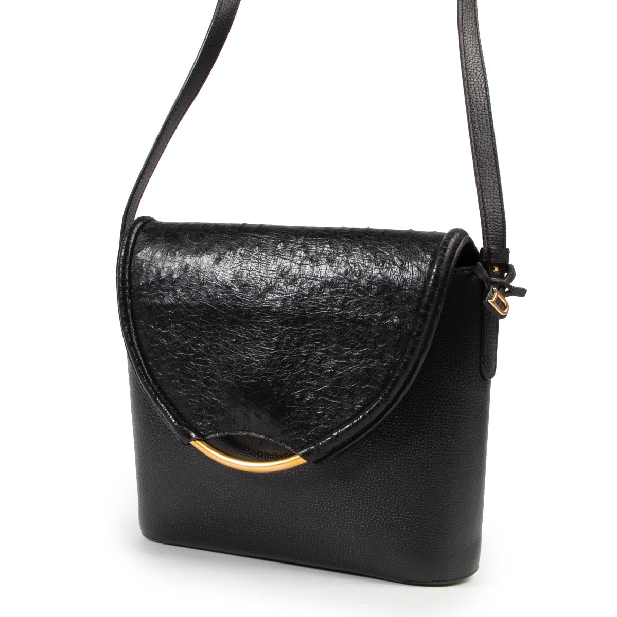 Online kopen van tweedehands authentieke Delvaux eclair handtas in zwart leer.
