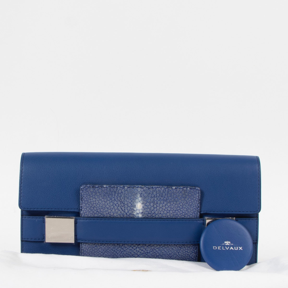 Shop safe online at Labellov in Antwerp this 100% authentic second hand Delvaux Bleu De Prusse Galuchat Madame Clutch