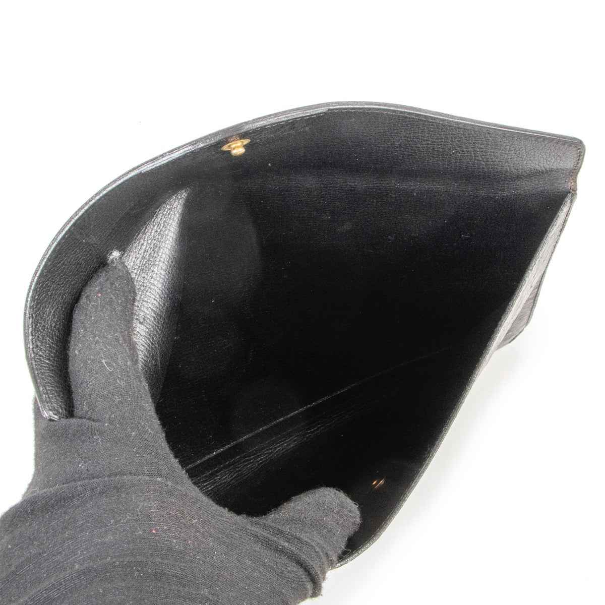 Buy an authentic second hand Delvaux Black Ostrich Leather Envelop Clutch in very good condition at Labellov