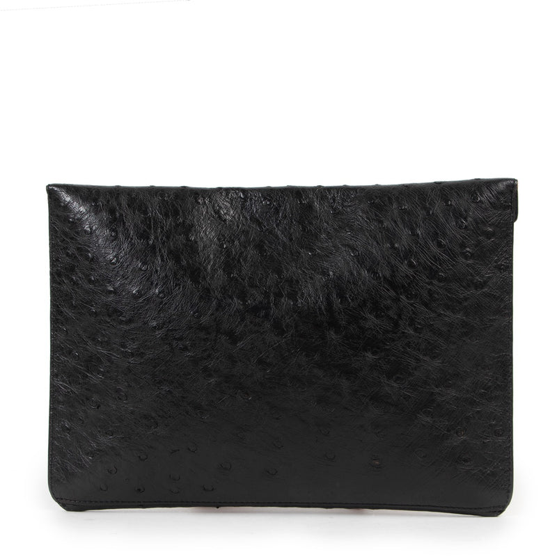 Buy an authentic second hand Delvaux Black Ostrich Leather Envelop Clutch in very good condition at Labellov