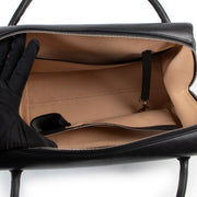 Buy and sell. your designer vintage items such as this Delvaux Black Brillant 12H Fauve Bourgogne Bag at Labellov.
