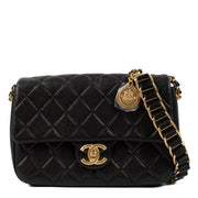 shop 100% authentic second hand Chanel 21A Black Caviar Medallion Soul Medium Classic Flap Bag on Labellov.com