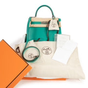 Hermès Kelly Retourne 28 Verso Evercolor Vert Verone and Bleu Du Nord now available at Labellov online or in store. Get your Hermès Kelly online or step by in our store.