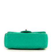 Shop authentic second hand luxury designer Chanel Green Quilted Lambskin Mini Classic Flap Bag at Labellov