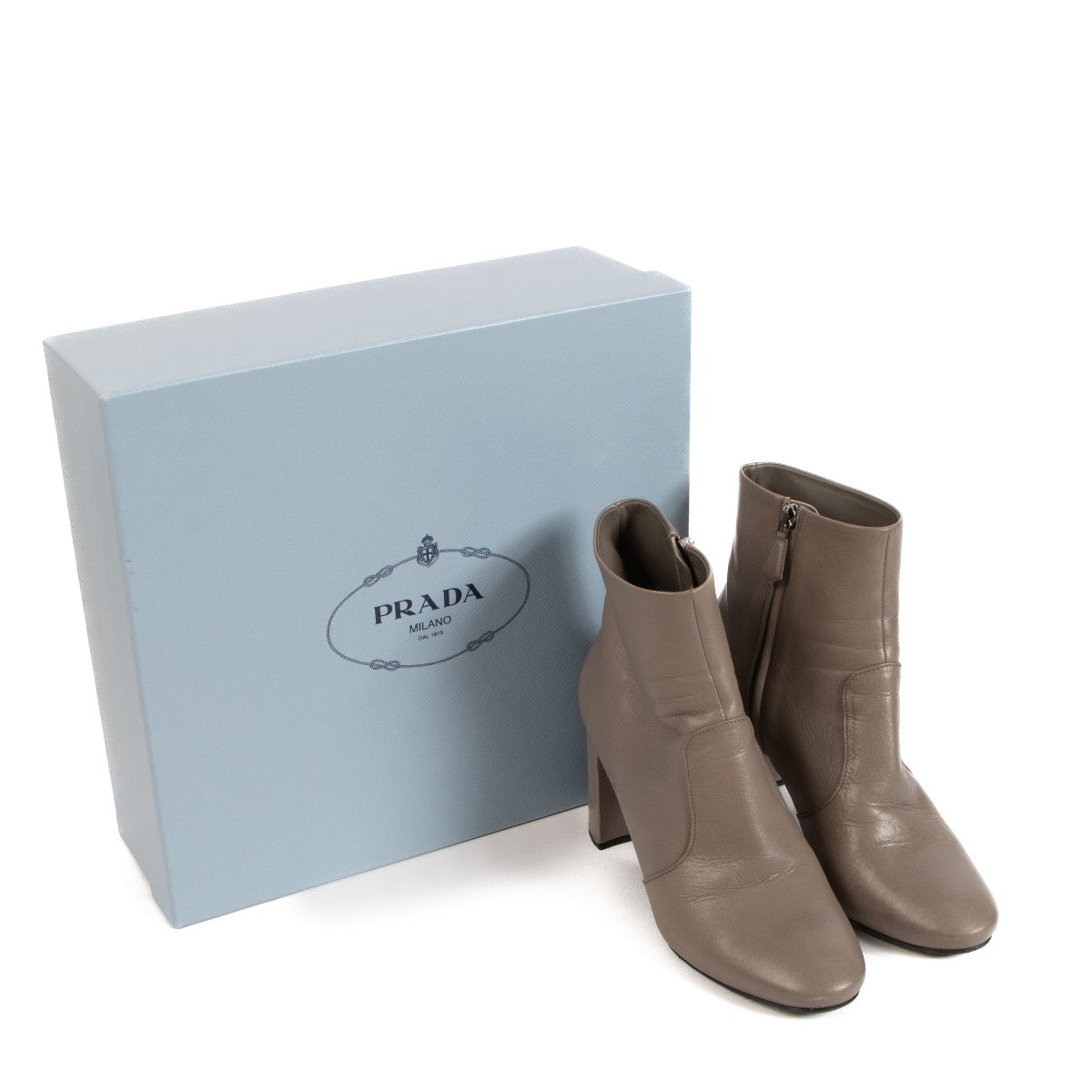 Shop safe online at Labellov in Antwerp, Brussels and Knokke these 100% authentic second hand Prada Taupe Leather Ankle Boots - size 38,5