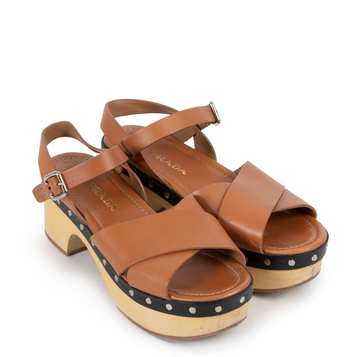 Prada Wooden Brown Platform Flats - Size 39,5 available at Labellov. Ready for a new life. Buy and sell your designer vintage shoes and handbags at our vintage store in Antwerp