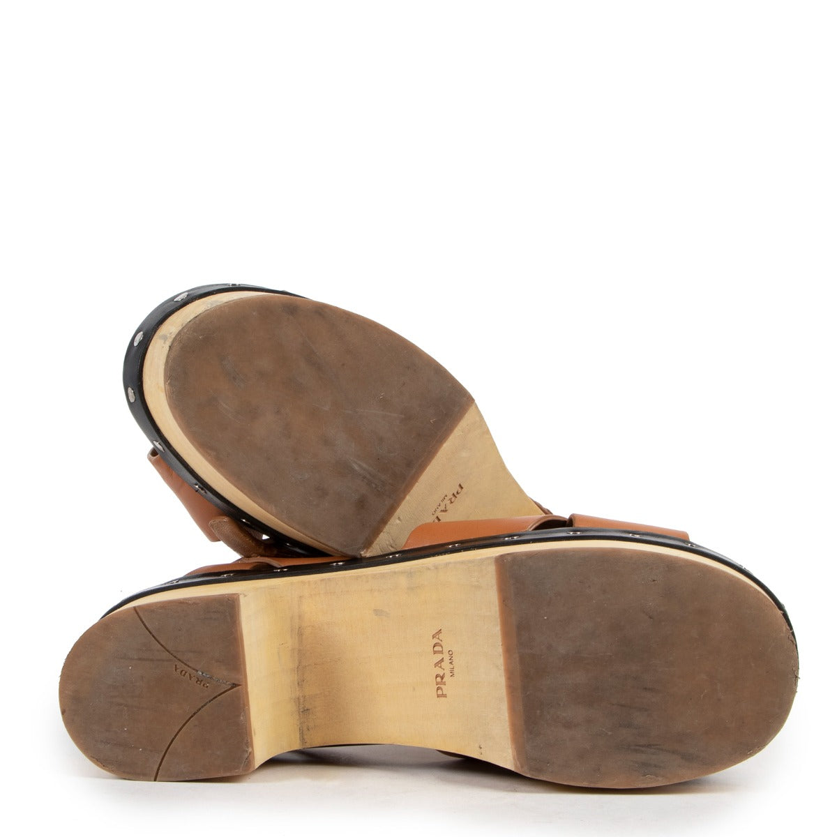 Prada Wooden Brown Platform Flats - Size 39,5 available at Labellov. Ready for a new life. Buy and sell your designer vintage shoes and handbags at our vintage store in Antwerp
