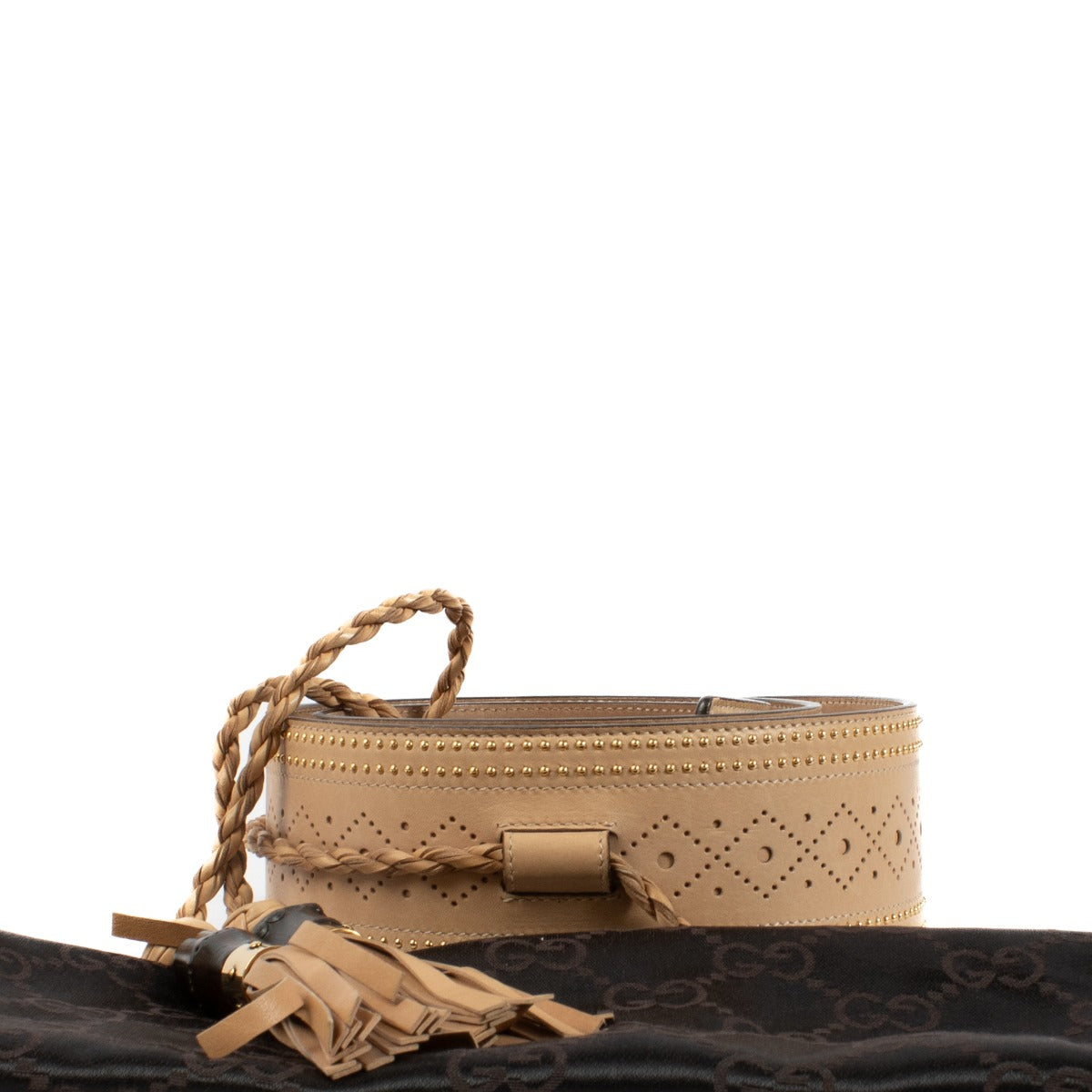 Gucci beige leather belt with bamboo and tasseled accents, finished with gold-tone hardware.